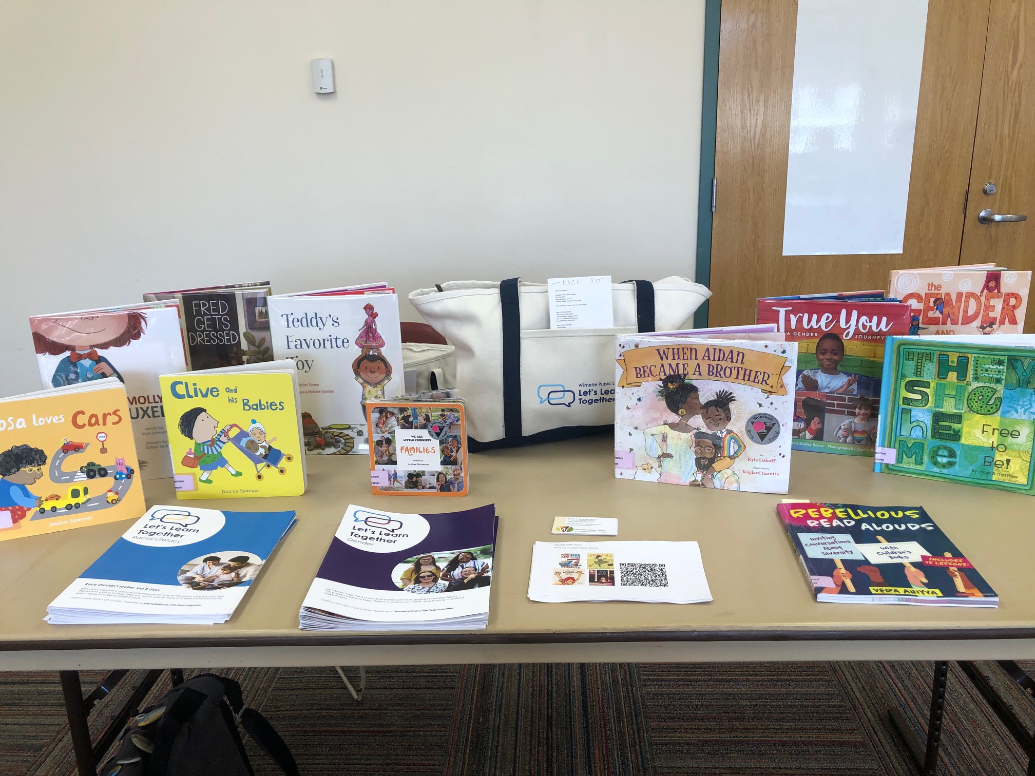 picture books and brochures on a table